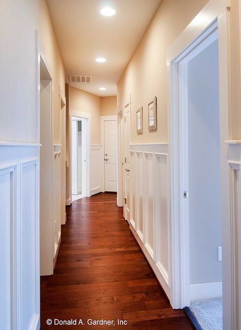 Geogeous #hardwood #floors and #paneling in The Bluestone, plan 1302. http://www.dongardner.com/plan_details.aspx?pid=4413. Craftsman Hallway, Huge Laundry Room, Bedroom Huge, White Rocking Chairs, Angled Garage, Plumbing Layout, Hallway Flooring, Floor Plan Drawing, Contemporary Cottage