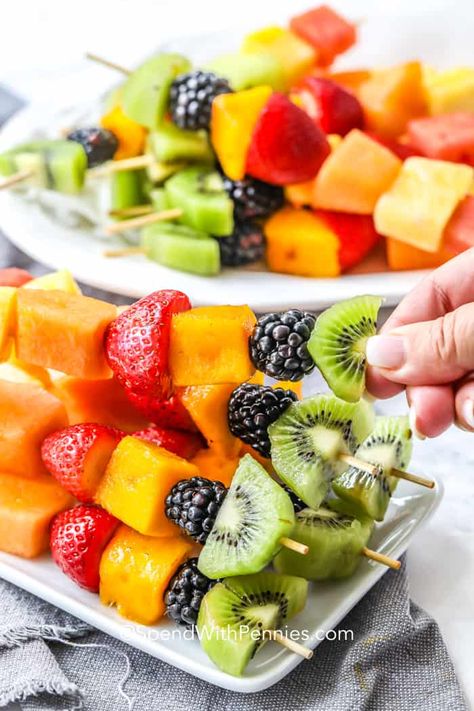 Fruit kabobs are the perfect summer appetizer to serve at a party! Choose your favorite fresh fruits, making them as simple as you want, thread them onto skewers before chilling. These are so easy to make ahead of time and are delicious served with fruit dip! #spendwithpennies #fruitkabobs #fruitskewers #summerrecipes #snack #dessert #appetizer Aloha Burger, Rainbow Fruit Kabobs, Salads With Fruit, Cheap Party Food, Fruit Kabob, Fruit Salad With Pudding, Easy Make Ahead Appetizers, Easy Fruit Pizza, Fruit Kebabs