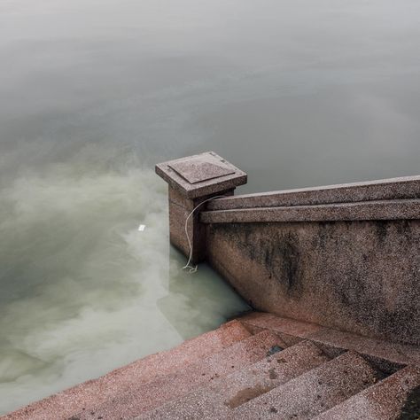 Adam Birkan - I love the colours of the murky water.  The top of the handrail post has an Oriental feel (not sure where this was taken) and the colour of the water has a jade green look, like the stones they sell in certain parts of Asia that are supposed to bring good luck to you.  I also like the mystery of not knowing where this staircase used to lead to before the potential flood. They have half flooded staircases like this in Venice too, so you don't know where  idea where they used to go. D20 Modern, Water Flood, Stone City, Spring Studios, Water Aesthetic, Ohio University, Juxtapoz Magazine, The Haunting, Good Luck To You