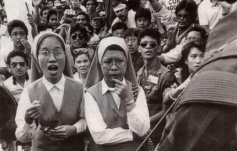 People from all walks of life gather at EDSA to protect the mutineers.  (Photo by Pete Reyes) Edsa People Power Revolution, Philippine Presidents, People Power Revolution, Revolution Poster, Ghost Rider Wallpaper, Revolution Art, Peoples Actions, Philippine Women, Jungle Theme Birthday