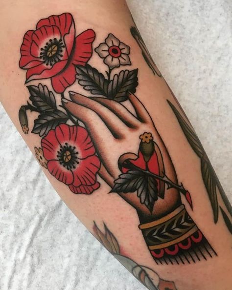 American Traditional Flower Tattoos: A Visual Guide Traditional Poppy Tattoo, Traditional Tattoo Sleeve Filler, Traditional Flower Tattoo, Traditional Hand Tattoo, Poppy Flower Tattoo, Tattoo Sleeve Filler, Traditional Tattoo Inspiration, Traditional Tattoo Flowers, Traditional Style Tattoo