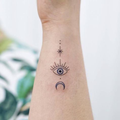 Evil eye tattoo located on the wrist, minimalistic 3rd Eye Tattoo, Wrist Bracelet Tattoo, Evil Eye Tattoo, Back Of Neck Tattoo, Forearm Tattoo Women, Wrist Tattoos For Women, Eye Tattoo, Simplistic Tattoos, Forearm Tattoos