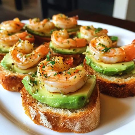 🦐 Garlic Shrimp Crostini with Avocado 🥑 Ingredients: For the Crostini: 🥖 1 baguette, sliced into 1/2-inch pieces 🧈 2 tbsp olive oil 🧄 1 clove garlic, halved (for rubbing) For the Garlic Shrimp: 🍤 1/2 lb large shrimp, peeled and deveined 🧄 2 cloves garlic, minced 🧈 1 tbsp butter 🧂 Salt & pepper to taste 🌿 1 tbsp fresh parsley, chopped For the Avocado Spread: 🥑 1 large avocado, mashed 🍋 1 tsp lemon juice 🧂 Salt & pepper to taste Instructions: Prepare the Crostini: Preheat oven to 400°F (200°... Shrimp And Avocado Crostini, Mini Avocado Toast Appetizer, Shrimp Crustini Appetizers, Shrimp Charcuterie Board, Olive Appetizer Ideas, Charcuterie Cocktail, Shrimp Crostini, Cocktail Snacks, Garlic Parmesan Shrimp