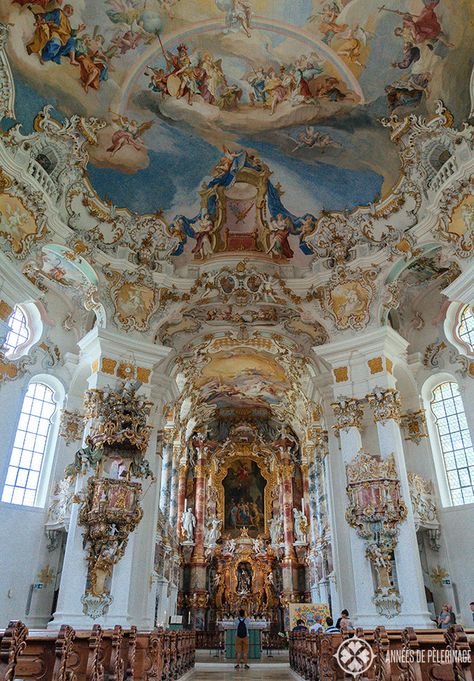 The Pilgrimage Church of Wies, also known as Wieskirche in German, is a rococo church located in Bavaria, Germany. The church was designed by brothers J.B. and Dominikus Zimmermann. The interior features fresco surrounded by stucco decorations and gilded sculptures. The alter features a statue of the Scourged Savior. Day Trips From Munich, Rococo Interior, Cathedral Architecture, Sacred Architecture, Church Interior, Church Architecture, Perfect Itinerary, Munich Germany, Bavaria Germany