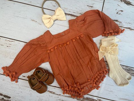 This adorable soft and lightweight cotton boho romper features a pumpkin spice orange color on 95% cotton, 5% stretchy polyester. This set includes your choice of the full set shown in the photo or any combo of the following pieces: Romper, headband, socks, and shoes. Romper has snaps around legs for easy diaper changes and buttons on the back. Perfect outfit for birthday, baptism, Easter, Thanksgiving, Christmas, special occasions, photo props, weddings, or just for fun! Available in newborn to November Newborn Outfits, Newborn Fall Outfits Girl, Baby Girl Pumpkin Patch Outfit, Fall Outfits For Baby Girl, Fall Newborn Outfits, Baby Fall Outfits Girl, Newborn Thanksgiving Outfit, Baby Fall Outfits