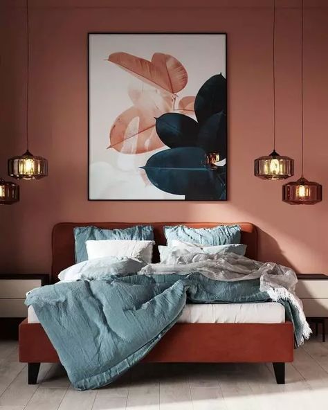 a bold and eye catchy bedroom with terracotta walls, a burnt orange bed with blue bedding, clusters of pendant lamps and a bold artwork Maximalist Living Room Decor, Terracotta Bedroom, Terracotta Walls, Dark Green Living Room, Bold Bedroom, Bedroom Orange, Bedroom Red, Beautiful Living Rooms, Blue Bedroom