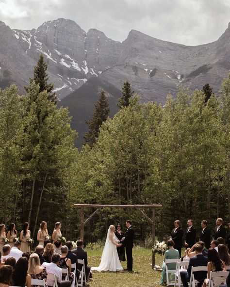 Real Astrid & Mercedes bride Desiree + Tyson's Alberta Wedding with Epic Mountain Views | Dress: Astrid & Mercedes Lovely | photographer: Willow & Wolf | ceremony: Rundleview Park, Canmore | reception: Cornerstone Theatre, Canmore | florals: Wild Magnolia Floral | hair + makeup: The Pretty Haus Mountain Wedding Dress, Mountain View Weddings, Willow Wolf, Canmore Wedding, Outdoor Winter Wedding, Glacier National Park Elopement, Alberta Wedding, Rustic Wedding Photography, Alaska Wedding