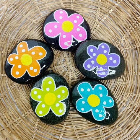 Add This Adorable Set Of 5 Colorful Flower Hand Painted Decorative Rocks To Your Easter Or Spring Holiday Home Decor. Perfect For Tablescapes, Front Porch, Easter Basket Stuffers, Desk Top Paperweight, Bookshelf And More. Add A Little Holiday To Your Porch Or Patio. Decorate Your Garden. Oval/Round Shape Rock Measuring 1.5-2" Wide And 1-1.5" Long. There Are So Many Wonderful Opportunities To Spread Love And Kindness Through Unique And Thoughtful Gifts. All Good Rocks Shop Offers Gifts For Men An Flower Painted Rocks, Decorative Rocks, Story Stones, Easter Basket Stuffers, Love And Kindness, Globe Decor, Wine Signs, Rock Painting Patterns, Rock Decor