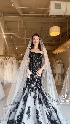 Cat Woman Wedding Dress, Wedding Dress Gothic White, White Black Wedding Dress, Mavis Wedding Dress, White Gothic Wedding Dress Victorian, Black And Silver Wedding Dress, Black And White Wedding Dress With Sleeves, Goth White Wedding Dress, White Goth Wedding Dress