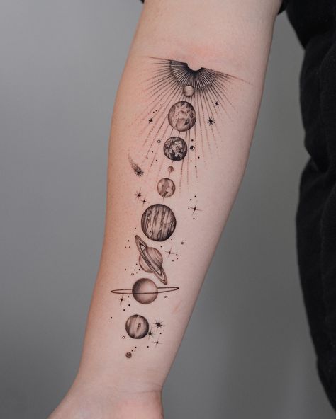 13 Space-Themed Tattoos That Are Out of This World - Fame & Frills Geometric Planets Tattoo, Underwater Space Tattoo, Planet Jupiter Tattoo, Saturn And Flowers Tattoo, Cool Tattoo Sleeves For Women, Andromeda Galaxy Tattoo, Alien Hand Tattoo, Tiny Earth Tattoo, Spaced Out Tattoos