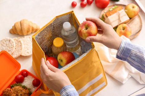 Woman packing meal into lunch box bag on light background, closeup stock images Picture Of Woman, Packing Lunch, Lunch Box Bag, Pack Lunch, Light Background, Bag Light, Box Bag, Lights Background, Royalty Free Photos