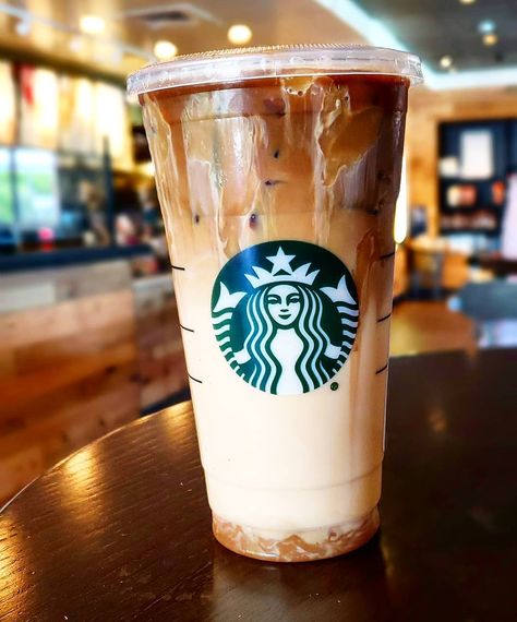 Caramel or Carmel? . . Venti Iced Caramel Machiatto  3 pumps vanilla 2 pumps pumpkin sauce . . . . . . . . . . . .   #basic #starbucks #psl #pumpkinspice #fall #sdfoodies #brandnew #hot #cute #drinkporn #foodporn #dessert #icecream #popular #photography #chaittea #chai #iced #coffee #latte #espresso #machiatto #icedcoffee #icedtea #new #foodie #foodiesd #sandiegofoodie #sandiegofoodies #hungry Iced Caramel Machiatto, Chai Iced Coffee, Iced Latte Starbucks, Starbucks Vanilla Iced Coffee, Starbucks Vanilla Latte, Starbucks Psl, Coffee Black And White, Coffee Calories, Coffee With Cream