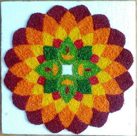 Another Rangoli with coloured rice | Indusladies Rangoli Designs With Rice, Easy Small Rangoli Designs, Easy Small Rangoli, Rice Rangoli, Rangoli Designs For Beginners, Onam Pookalam Design, Small Rangoli Designs, Coloured Rice, Onam Pookalam