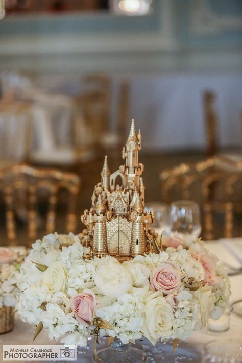 Disney themed wedding with the Disney castle for the top table centrepiece. Image by Michelle Charnock Photographer Fairy Tail Table Decorations, Fairy Tale Theme Quinceanera, Cinderella Wedding Theme Centerpieces, Aurora 15 Theme, Disney Themed Table Centerpieces, Fairytale Wedding Theme Table Decor, Disney Sweetheart Table Wedding, Disney Themed Wedding Tables, Disney Castle Centerpiece