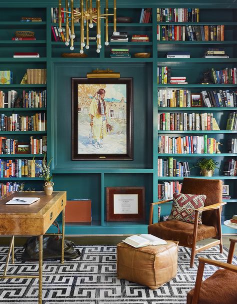 Turquoise bookcase with large artwork and gold chandelier in home workspace small wood desk and leather armchairs. Home Library Rooms, Home Library Design, Built In Bookcase, Spare Bedroom, Murphy Bed, Home Library, Front Room, Home Office Design, 인테리어 디자인