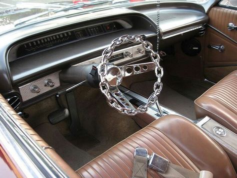 Chevy Impala with Chrome Chain Link Steering Wheel Lowrider Steering Wheel, Chain Steering Wheel, Wheels Cake, Cardboard Box Car, Matte Black Cars, James Bond Cars, Shelby Car, Car Wheels Diy, Bond Cars