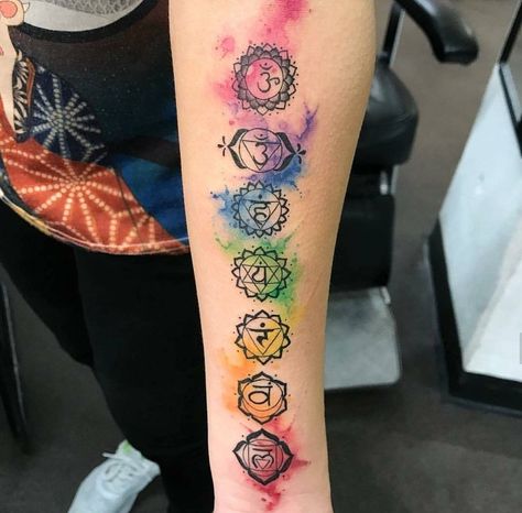 215+ Spirited Chakra Tattoo Designs and Ideas (2023) - TattoosBoyGirl Tattoo Dublin, Back Tattoo Women Spine, Om Tattoo Design, Chakra Tattoo, Spine Tattoos For Women, Chakra Colors, Spiritual Tattoos, Shoulder Tattoos For Women, Modern Tattoos