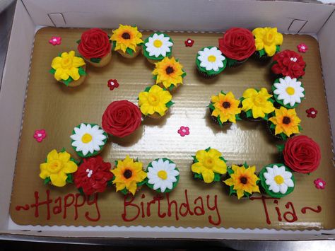 Daffodils, Roses, Sunflowers, and Daisy Cupcake creation Flower Cupcake Cake, Buttercream Flowers Cupcakes, Cupcakes Flores, Daisy Cupcakes, Sunflower Cupcakes, Pull Apart Cupcake Cake, Flower Cupcake, Pull Apart Cake, Sunflower Party