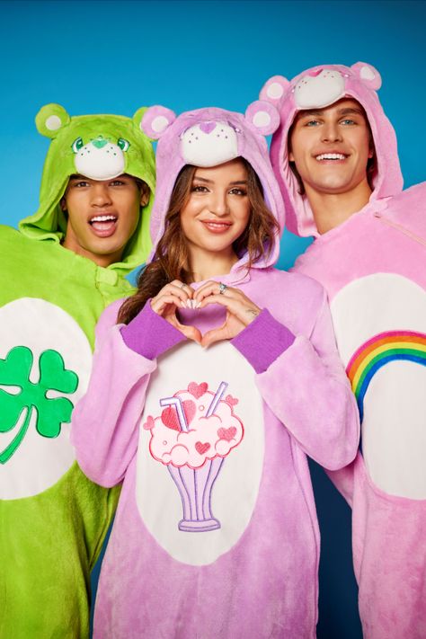 Make this Halloween the cutest and coziest one yet when you sport this officially licensed Adult Good Luck Bear Jumpsuit Costume! Complete with plush green fabric and a charming shamrock belly design, this jumpsuit is perfect for lovers of all things Care Bears. Cute Carebear Costumes, Carebear Group Halloween Costumes, Care Bear Halloween Costume, Trio Halloween Costumes Care Bears, Adult Care Bear Costume, Care Bear Costume Onsie, Care Bears Halloween Costume, Good Luck Bear, Jumpsuit Costume