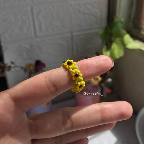 Stunning sunflower beaded ring! Handcrafted to bring warmth and happiness to your outfit! • Beaded • handmade • Price: 200/- • Dm to place Order #beadedrings #handmaderings #handmadejewelry #beadedjewelry #flowerjewellery #sunflowerring #sunflowerjewelry Rings To Make, Ring Day, Diy Beaded Rings, Sunflower Jewelry, Sunflower Ring, Beaded Ring, Jewellery Shop, Handmade Rings, Your Outfit