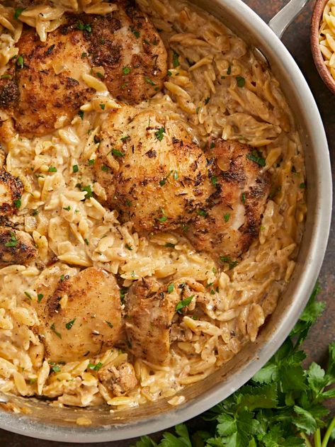 This easy and tasty Creamy Chicken and Orzo Skillet is a perfect dinner for those hectic nights when you barely have time to make rice. Bonus: it cooks in one pan! Can you ask for anything more? One Skillet Crispy Chicken Thighs & Creamy Lemon Garlic Orzo, Chicken Thigh Orzo Skillet, Chicken Thigh Recipes With Orzo, Chicken Thighs And Orzo Recipes, Chicken And Orzo Recipes, Creamy Chicken And Orzo, Creamy Chicken Thighs, Orzo Skillet, Chicken And Orzo