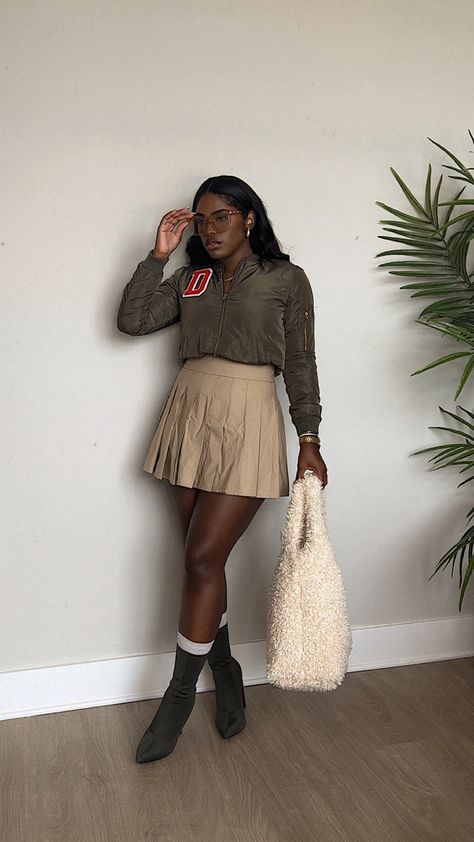 Grab your favorite school-related gear and pair with a skater skirt and some sock boots for the ultimate tailgating outfit! Pinterest Creators hbcu homecoming outfits, hbcu outfits, hbcu fashion • Skirt: Amazon • Boots: Ego • Bag: Target Darty Szn Outfits College Hbcu, College Football Game Outfit Hbcu, Hbcu Football Game Outfits, Hbcu Homecoming Outfits, Amazon Boots, Hoco Fits, Hbcu Outfits, Hbcu Apparel, Hbcu Homecoming