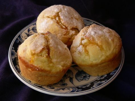 This recipe is adapted from a New Zealand cookbook called Quick n' Easy Muffins, Cakes, Biscuits, Slices, Loaves, Scones, and was voted a winner after being served to my daughter's teachers at school as a birthday tray. DO grease the pan well so that they slip out easily and if the jam leaks out, get the muffin out of the form while it's still warm because once the jam is cold, it's hard to remove (I used a plastic picnic knife to ease mine out of my muffin form). And yes, you read correctly, th Jam Muffins, Apricot Muffins, Apricot Jam Recipes, Baking Bowl, Muffin Tin Recipes, Muffin Mix, Apricot Jam, Breakfast Time, Quick Bread