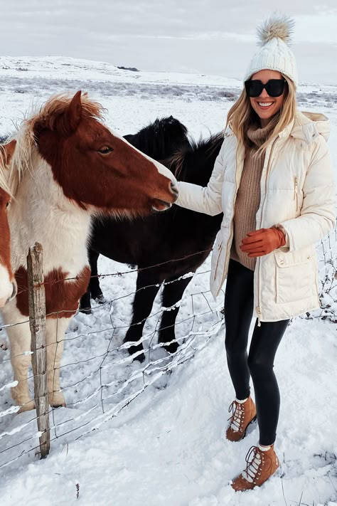 Fashion Jackson Wearing White Puffer Coat Winter Boots Iceland Horses Iceland Travel Guide Iceland Fashion, White Puffer Coat, Winter Vacation Outfits, Iceland Trip, Mountain Outfit, White Puffer, Snow Outfit, Fashion Jackson, Iceland Travel