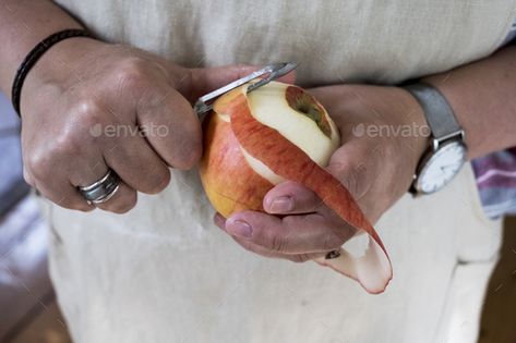 Close up of person peeling a red apple with a double bladed peeler. by Mint_Images. Close up of person peeling a red apple with a double bladed peeler. #Sponsored #peeling, #red, #Close, #person Apple Images, Red Apple, Food Photo, Fresh Food, Close Up, Mint, Red, Quick Saves