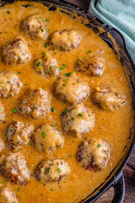 Flavorful, filling and comforting these Copycat IKEA Swedish Meatballs are a delicious recipe that you can make at home! A fun recipe that the whole family will fall in love with. Swedish Meatball Recipe Crockpot, Swedish Meatball Sauce, Ikea Swedish Meatballs, Chicken Mushroom Casserole, Beef And Pork Meatballs, Lingonberry Jam, Swedish Cuisine, Crockpot Chicken And Noodles, Swedish Food