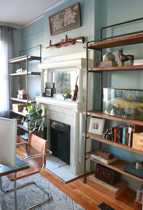 Design plans for these industrial plumbing pipe bookcases we built for our front office! Industrial Modern Office, Blue Couch Living, Industrial Pipe Furniture, Plumbing Pipe Furniture, Industrial Bookcases, Vintage Industrial Furniture, Pipe Furniture, Industrial Shelving, Plumbing Pipe