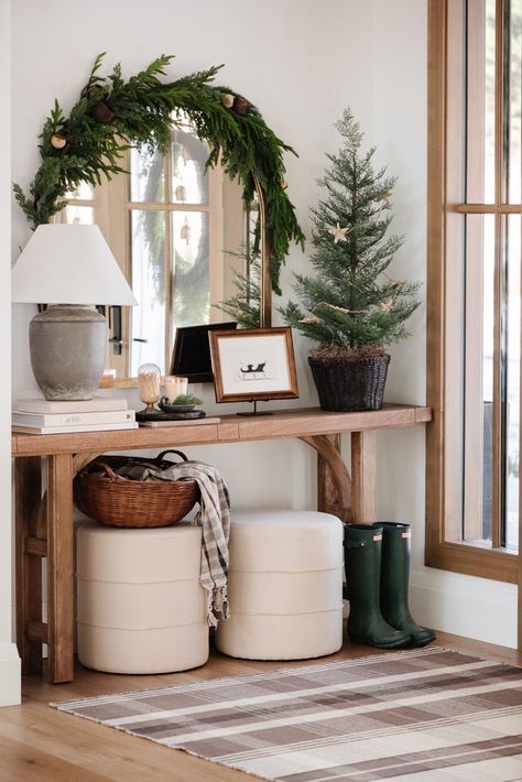 How To Decorate Top Of Buffet Cabinet, Books As Decor, Holiday Entryway, Christmas Foyer, Christmas Entry, Christmas Decor Trends, Entry Table Decor, Faux Christmas Trees, Christmas Entryway