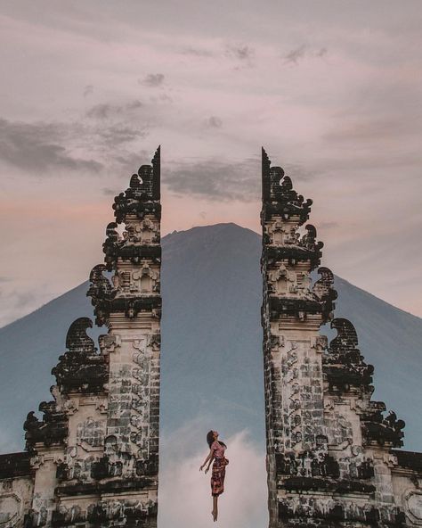 What an adorable view from top of this majestic temple ❤ • Lempuyang Temple, locally referred to as Pura Lempuyang Luhur, is one of Bali’s… Lempuyang Temple Bali, Bali Photoshoot, Bali Temple, Bali Travel Photography, Bali Instagram, Temple Bali, Bali Guide, Bali Trip, Relaxing Vacations