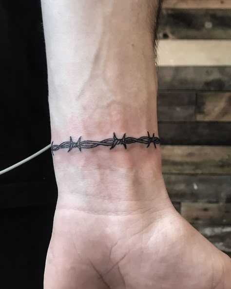 Geometric Wrist Tattoo, Mens Wrist Tattoos, Wrist Tattoo Placement, Anchor Tattoo Wrist, Bracelet Tattoo For Man, Barbed Wire Tattoo, Cross Tattoo On Wrist, Wire Tattoo, Patchwork Tattoos