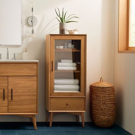 Mid-Century Collection | West Elm Mcm Bathroom, Mid Century Modern Bathroom, Mid Century Bathroom, Bathroom Floor Cabinets, Linen Cabinets, Glass Panel Door, Mid Century Modern Interiors, Cabinet Shelving, Key Details