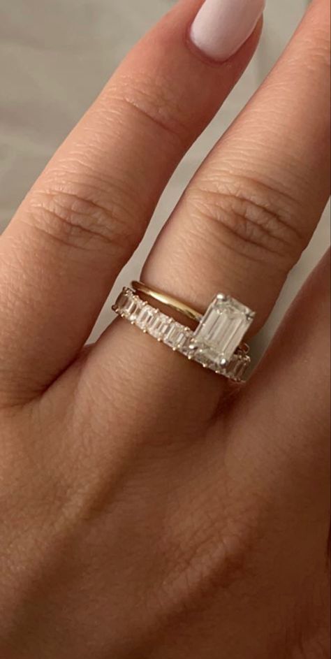 emerald cut ring
baguette wedding band
emerald engagement ring
engagement ring inspiration 
classic wedding band
timeless engagement ring Wedding Band With Emerald Cut Engagement, Emerald Cut Engagement Ring With Baguette Band, Rectangle Wedding Band, Engagement Ring Inspo Gold, Baguette Ring Stack, Baguette Wedding Band With Emerald Ring, Emerald Cut Solitaire Engagement Ring With Wedding Band, Band For Emerald Cut Ring, Baguette Engagement Rings