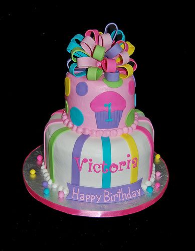 2 tier cupcake themed 1st birthday cake pink purple yellow green aqua with bow A For Adley, Birthday Cake Pink, Rodjendanske Torte, Themed 1st Birthday, 1st Birthday Cakes, Gateaux Cake, Green Aqua, 1st Birthday Cake, Gorgeous Cakes