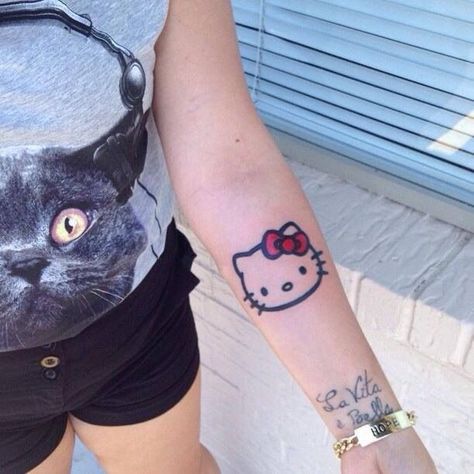 Swag Tattoo, Hello Kitty Tattoo, Kitty Tattoo, Hello Kitty Tattoos, Neck Tattoos Women, Wicked Tattoos, Petite Tattoos, Tattoo Signs, Tattoos For Black Skin