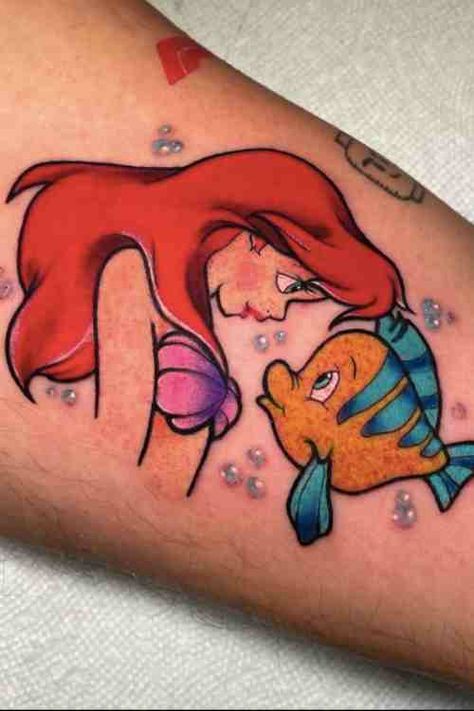 Beautiful Mermaid Tattoo Guide By Tattoo Designers - Tattoo Stylist King Triton Tattoo, Disney Princess Tattoo Ideas, Princess Tattoo Ideas, Tattoo Ideas Disney, Ariel Tattoo, Popular Disney Movies, Little Mermaid Tattoo, Tattoo Guide, Mermaid Tattoo Designs