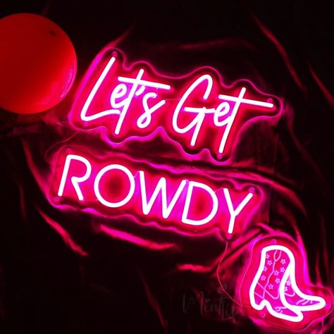 "✨✨Get ready to kick up some dust and let loose with our \"Let's Get Rowdy\" neon sign featuring stylish boots. This vibrant and eye-catching sign is perfect for adding a touch of country charm and energetic vibes to your space. Whether you're a line-dancing enthusiast, a rodeo fan, or simply love embracing the wild side of life, this neon sign is the perfect addition to your home, bar, or event venue. Let it light up your next gathering, create a lively atmosphere in your entertainment area, or serve as a bold statement piece in your favorite room. So, grab your cowboy boots, turn up the music, and let's get rowdy! This high quality neon sign will definitely make you satisfied! If you have any question about this neon sign, please contact us and we will make a mock up for you! 🤔How to cu Rodeo Neon Sign, Cowboy Party Aesthetic, Line Dancing Aesthetic, Neon Cowboy, Graduation Party Signs, Custom Wedding Decor, Space Cowboys, Entertainment Area, Cowboy Birthday