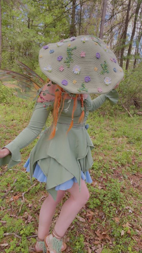 This Meadow Mushroom hat would be an extra whimsical addition to any fairy wardrobe! Decorated with flowers, clovers, and a bit of hanging ivy. (All hand crochet) It captures the essence of spring! Head Circumference: 21 1/2 inches Cap Diameter: 19 inches Mushroom Hat Reference, Whimsical Cottagecore Outfits, Mushroom Aesthetic Outfit, Mushroom Dresses, Mushroom Fairy Costume, Crochet Mushroom Hat, Mushroom Clothes, Fairy Wardrobe, Mushroom Hats