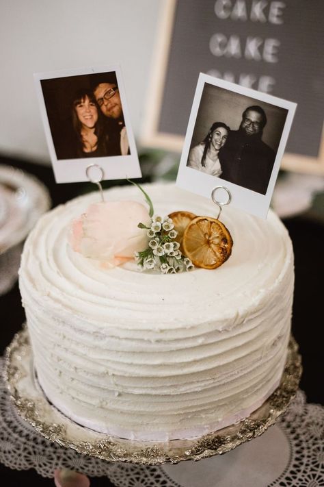 Vintage Inspired Book Wedding at the Newton | Vintage Polaroid wedding cake topper on top of orange cream cake by Bear and the Honey Phoenix.    Vintage Wedding Inspiration and Ideas |   Vintage Wedding Theme |   Vintage Wedding Photography |  Phoenix Arizona Wedding Photographer |   Downtown City Wedding |   Vintage Wedding Cake | Vintage Reception Decorations Polaroid Cake Topper, Cake Polaroid, Polaroid Cake, Vintage Reception Decorations, Orange Cream Cake, Bookstore Wedding, Photo Cakes, Vintage Reception, Wedding Cake Centerpieces