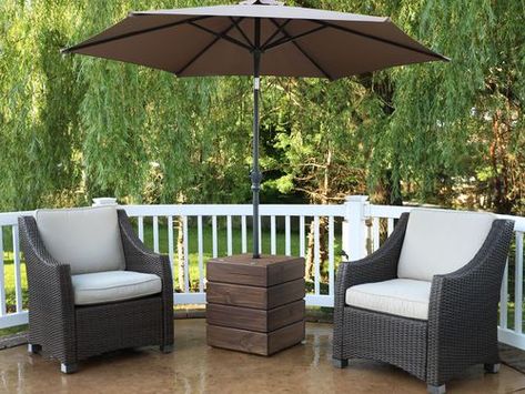 Patios - This Old House Umbrella Stand Diy, Outdoor Umbrella Table, Umbrella Stand Design, Diy Umbrella, Deck Rails, Umbrella Table, Outdoor Umbrella Stand, Modern Deck, Patio Umbrella Stand