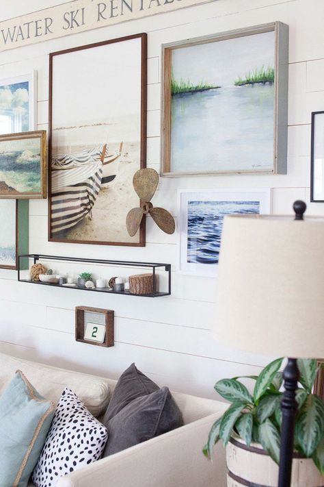 Create a Gallery Wall Using a Unique Collection Beachy Farmhouse Living Room, Farmhouse Gallery Wall, Coastal Farmhouse Decor, Nautical Wall Decor, Coastal Wall Decor, Regal Design, Living Room Update, Coastal Living Rooms, Beach Theme Decor