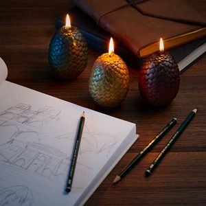 Dragon Egg Candle, Game Of Thrones Merchandise, School Gadget, Egg Candle, Light Games, Game Of Thrones Dragons, Hbo Game Of Thrones, Beautiful Dragon, Dragon Egg