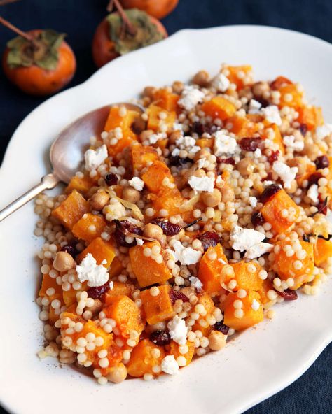 A vegetarian recipe for a hearty pearl couscous salad filled with roasted butternut squash and cranberries, tossed with a spiced vinaigrette. Butternut Squash And Cranberries, Recipe Couscous, Salad With Butternut Squash, Make Ahead Salads, Fall Picnic, Couscous Recipes, Couscous Salad, Squash Recipes, Meat Free