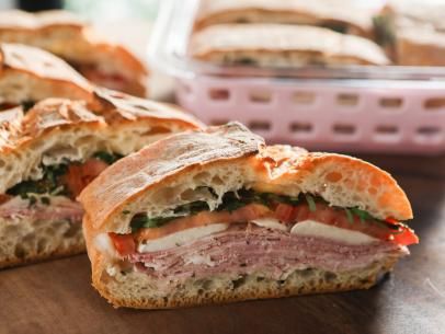 Make-Ahead Ham and Caprese Picnic Sandwich Recipe | Valerie Bertinelli | Food Network Picnic Sandwiches, Caprese Sandwich, Valerie Bertinelli, How To Cook Ham, Sandwiches For Lunch, Burgers Sandwiches, Picnic Food, Sandwich Recipe, Soup And Sandwich