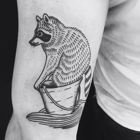 Raccoon in a bucket! Yay! #raccoon #raccoontattoo #animaltattoo #whimsical #blackwork #blackworkers #greenpoint #brooklyn American Traditional Raccoon, Pirate Hat Tattoo, Racoon Tattoo, Tatts Ideas, Brooklyn Tattoo, Raccoon Tattoo, Cupcake Tattoos, Tattoo Linework, Line Art Tattoo