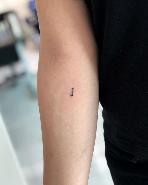 Mini J letter tattooed on the right forearm by @soychapa J Tattoos, Letter J Tattoo, J Letter, J Tattoo, Belly Tattoos, Omerta Tattoo, Tattoos Geometric, Initial Tattoo, Discreet Tattoos