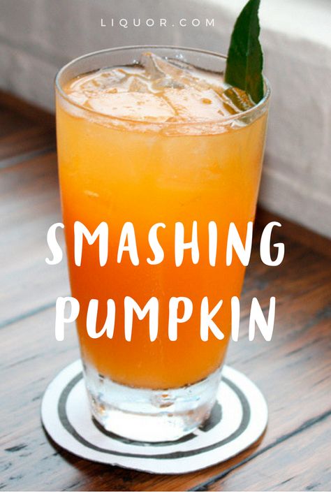 The Smashing Pumpkin is the perfect fall cocktail. The combination of rum, liqueur and lemon pumpkin soda, makes a delicious cocktail that's great for Halloween or Thanksgiving parties.' data-pin-url= Pumpkin Drinks Alcoholic, Fall Adult Drinks, October Cocktails, October Drinks, Pumpkin Cocktails, Autumn Drinks, Pumpkin Smash, Fall Cocktails Recipes, Fall Cocktail